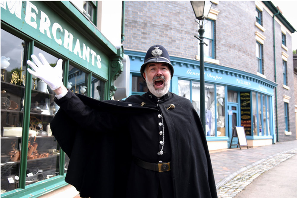 Image of a man dressed up as a Police officer.